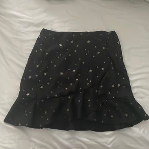 Altard State black skirt with gold stars. Size Small with working zipper.